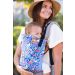 Tula Standard Baby Carrier Garden Party used by Lady to front carry a child