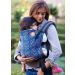 Lady front carries a sleeping toddler in a Tula Ripple Baby Carrier