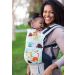 Women Front carries daughter in a Tula Standard Tulasaurus Baby Carrier