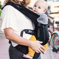 Beco 8 Black Charcoal baby Carrier used by lady to front carry baby
