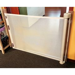 Smart Retract Retract-A-Gate Retractable Baby & Pet Safety Gate in cafe color used at a doorway