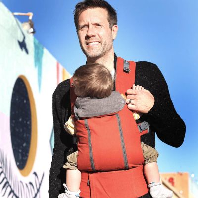 Beco 8 Baby Carrier Rust Charcoal used by father to front carry son
