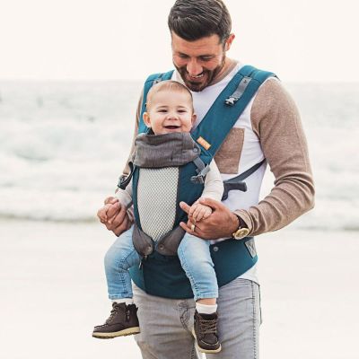 Beco 8 Teal Charcoal Baby Carrier used by father to carry son in front facing position at the beach