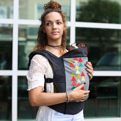 Lady using Boba 4G Peak Baby Carrier to carry newborn