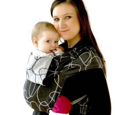 Didymos DidyTai Mei Tai Wrap conversion Baby Carrier Ellipses Black used by lady to carry her baby in front carry