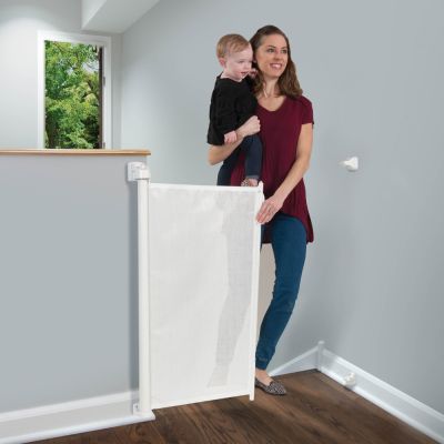 KidCo Retractable Safeway Gate White at top of stairs
