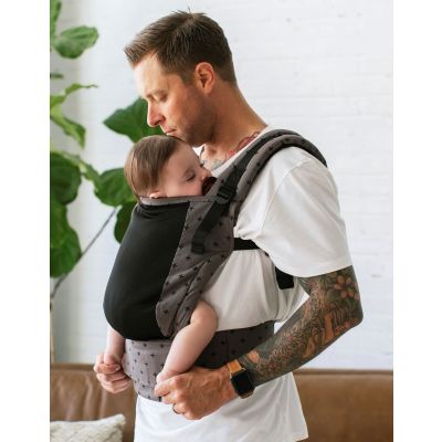 Tula Free-To-Grow Baby Carrier Coast Mason by father carrying sleeping baby