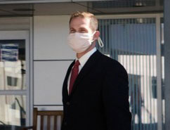 Man on business trip wearing a Breathe Healthy Anti Microbial Face Mask