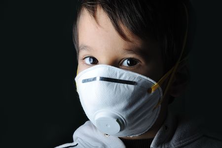 Child using an over-sized N95 mask